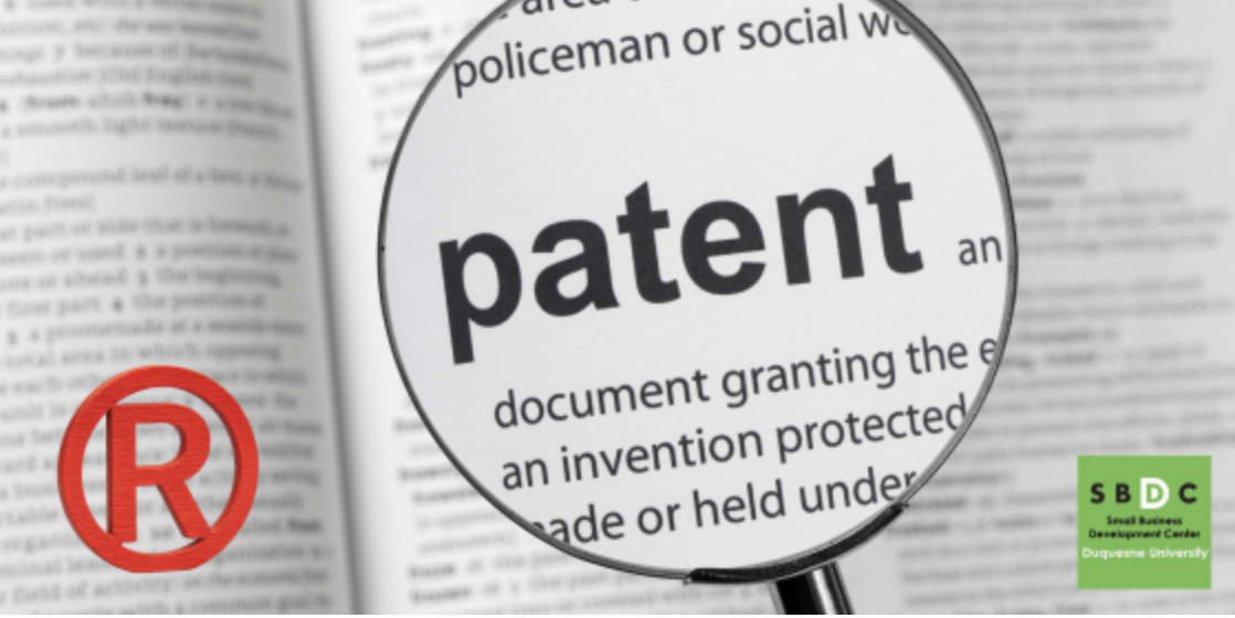 image showing the word patent in a magnifying glass