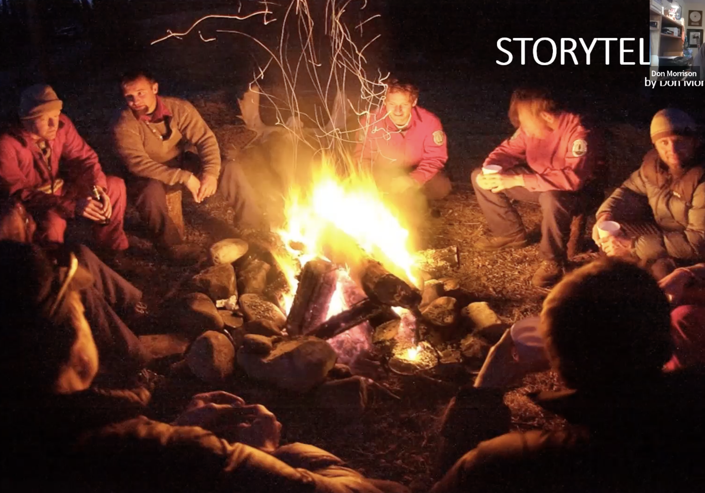 Storytelling by Don Morrison. Image shows people around a campfire.