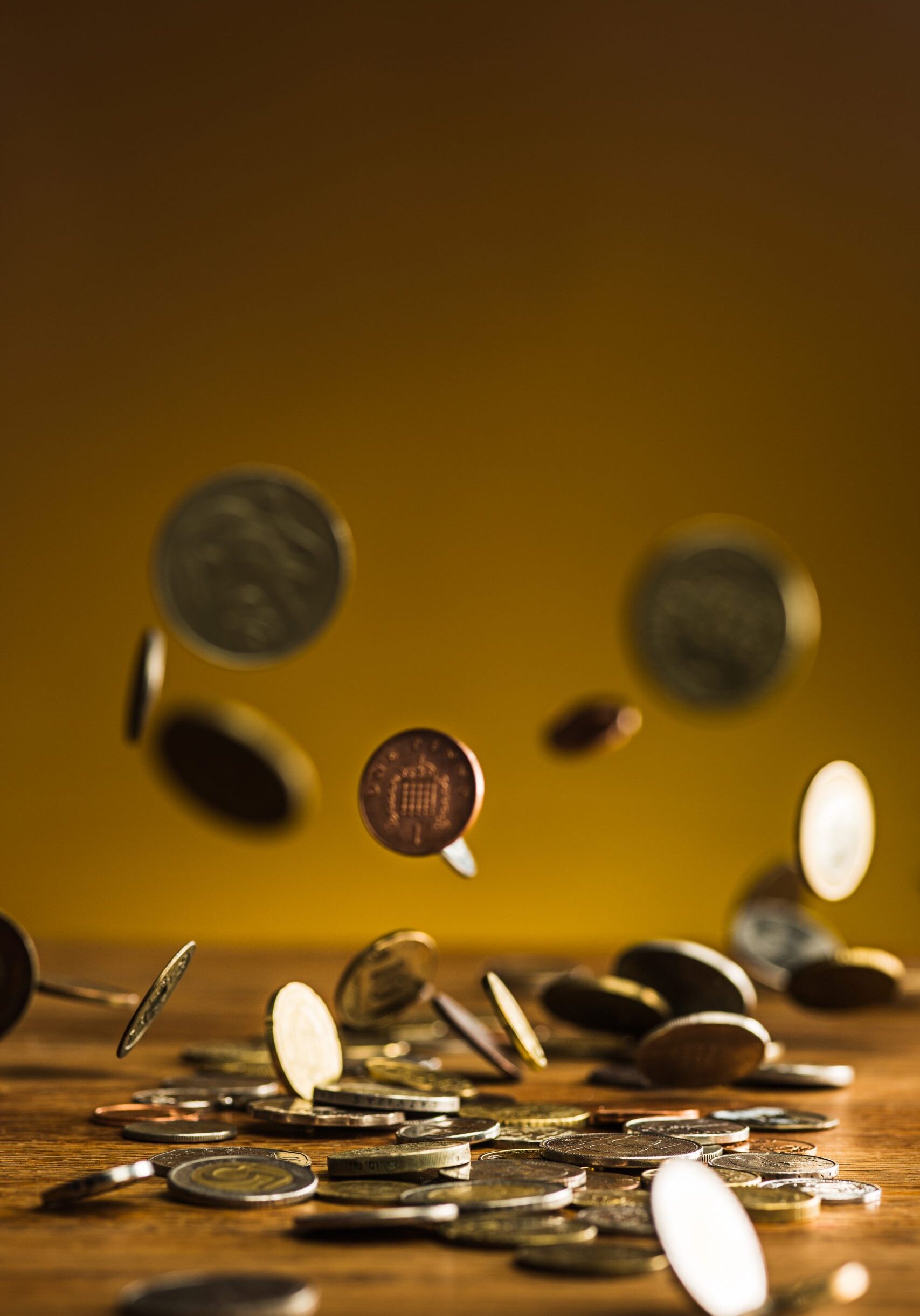 get paid. falling coins image